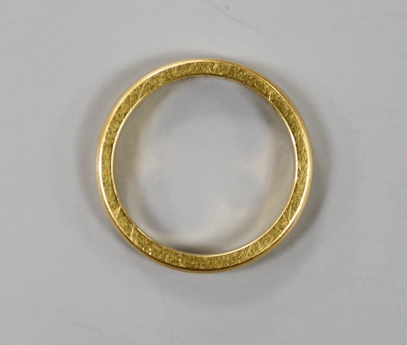 A 22ct gold wedding band, size J, 4.3 grams.